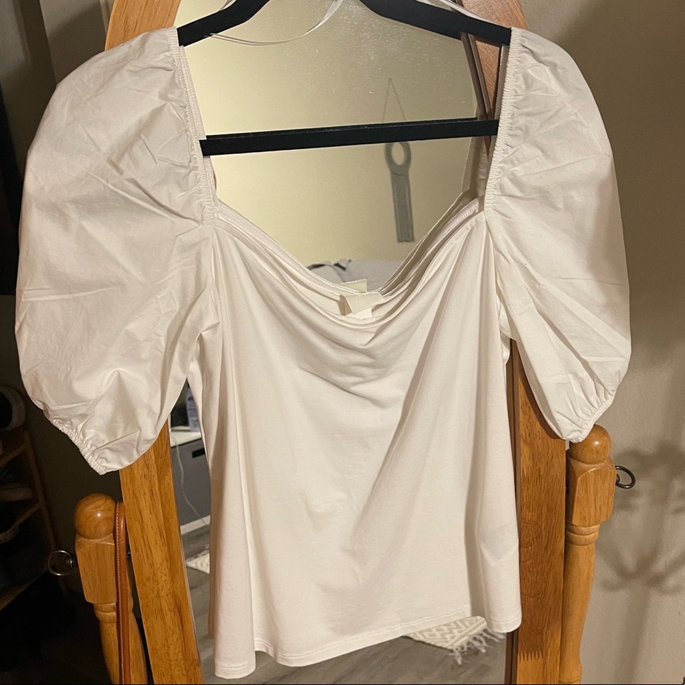 White puffy sleep top